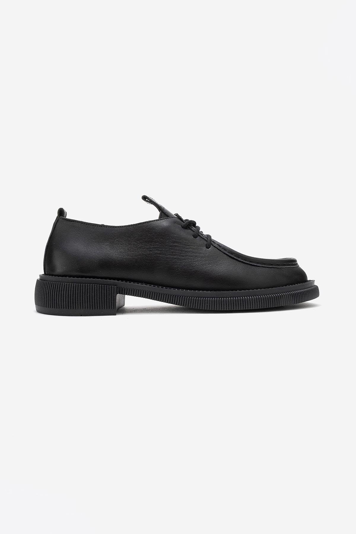 Marca - Mocasín de cuero negro con cordones (mujer)