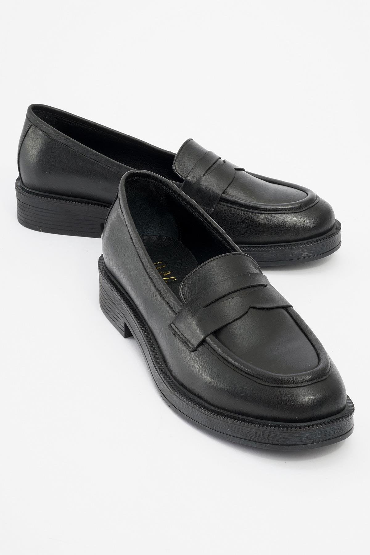 Bree - Mocasines de plataforma de cuero negro (Mujer)