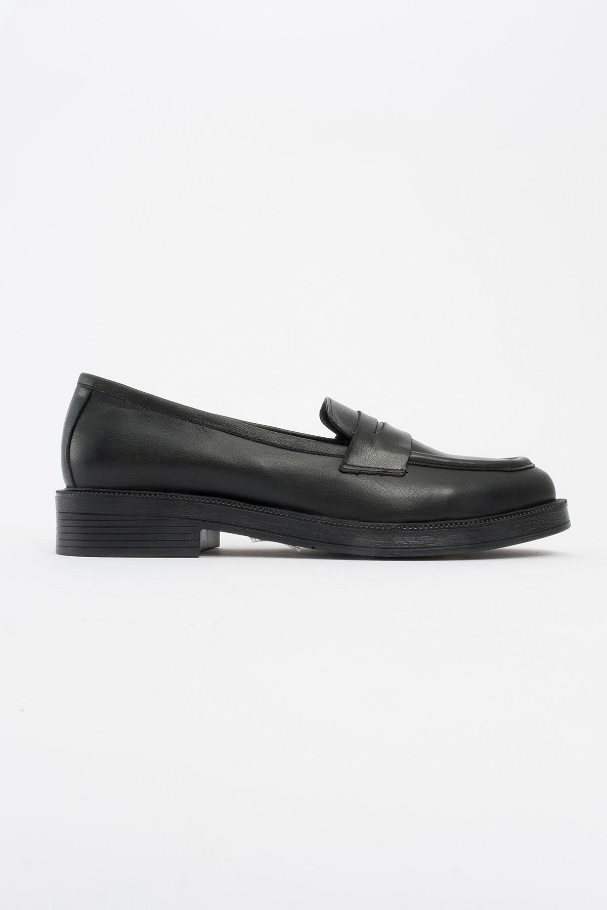 Bree - Mocasines de plataforma de cuero negro (Mujer)
