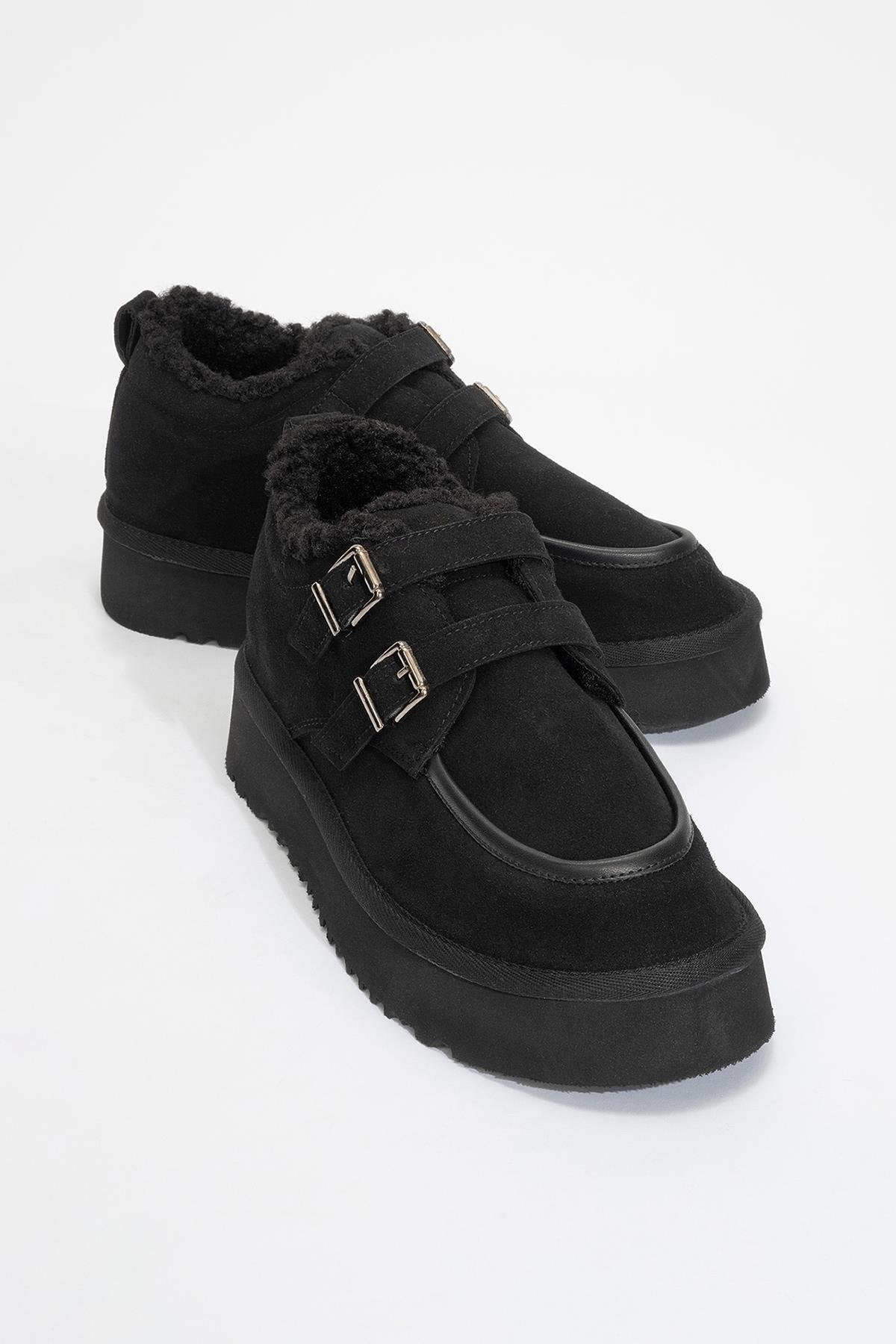Assos - Botín de piel con tacón y pelo, negro (Mujer)