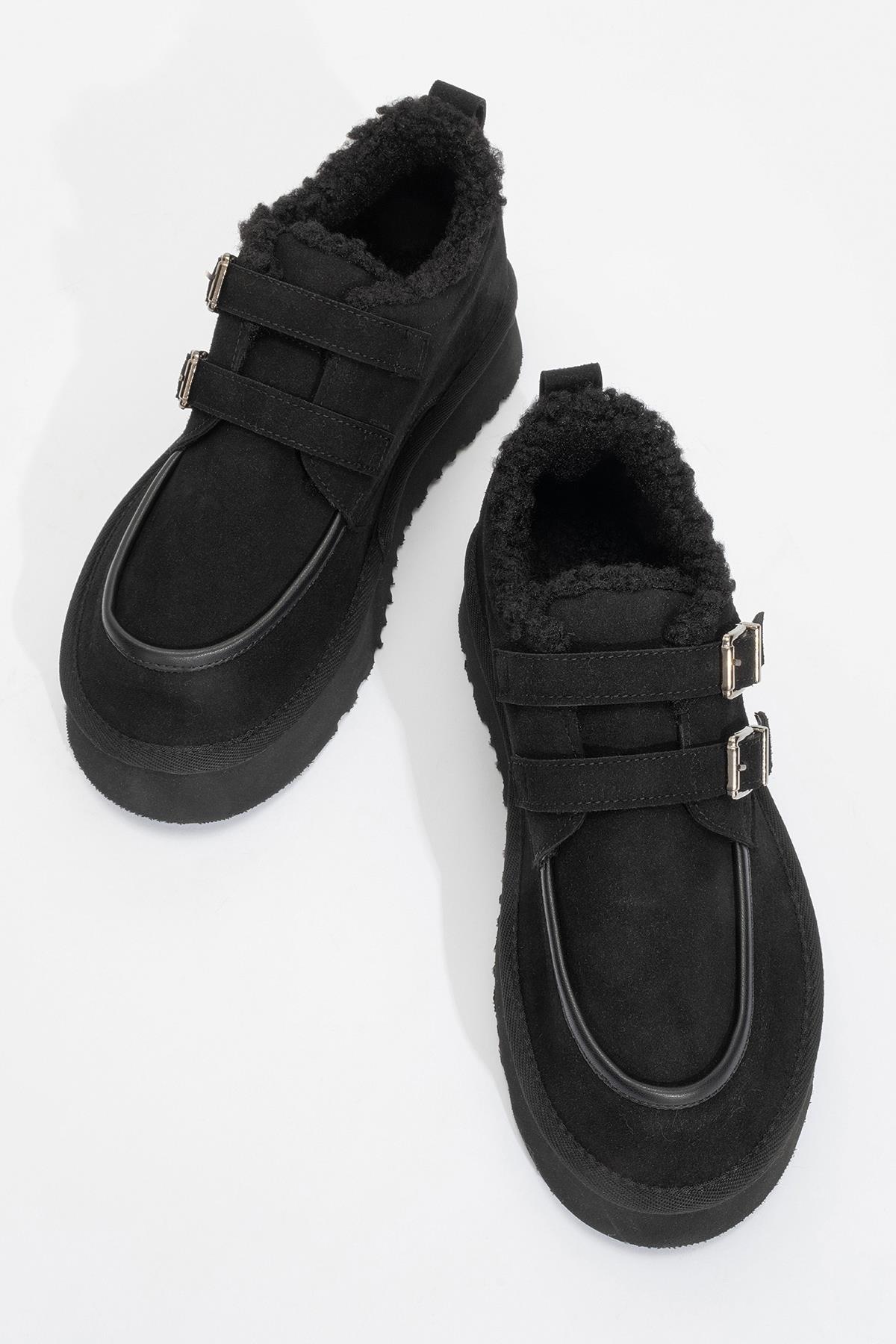 Assos - Botín de piel con tacón y pelo, negro (Mujer)