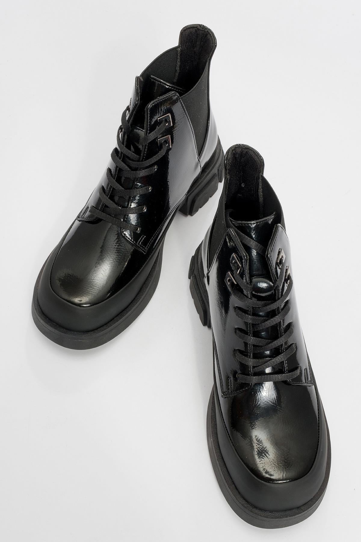 Challo - Bota de combate elástica de charol negro (Mujer)