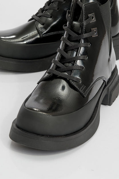 Challo - Bota de combate elástica de charol negro (Mujer)