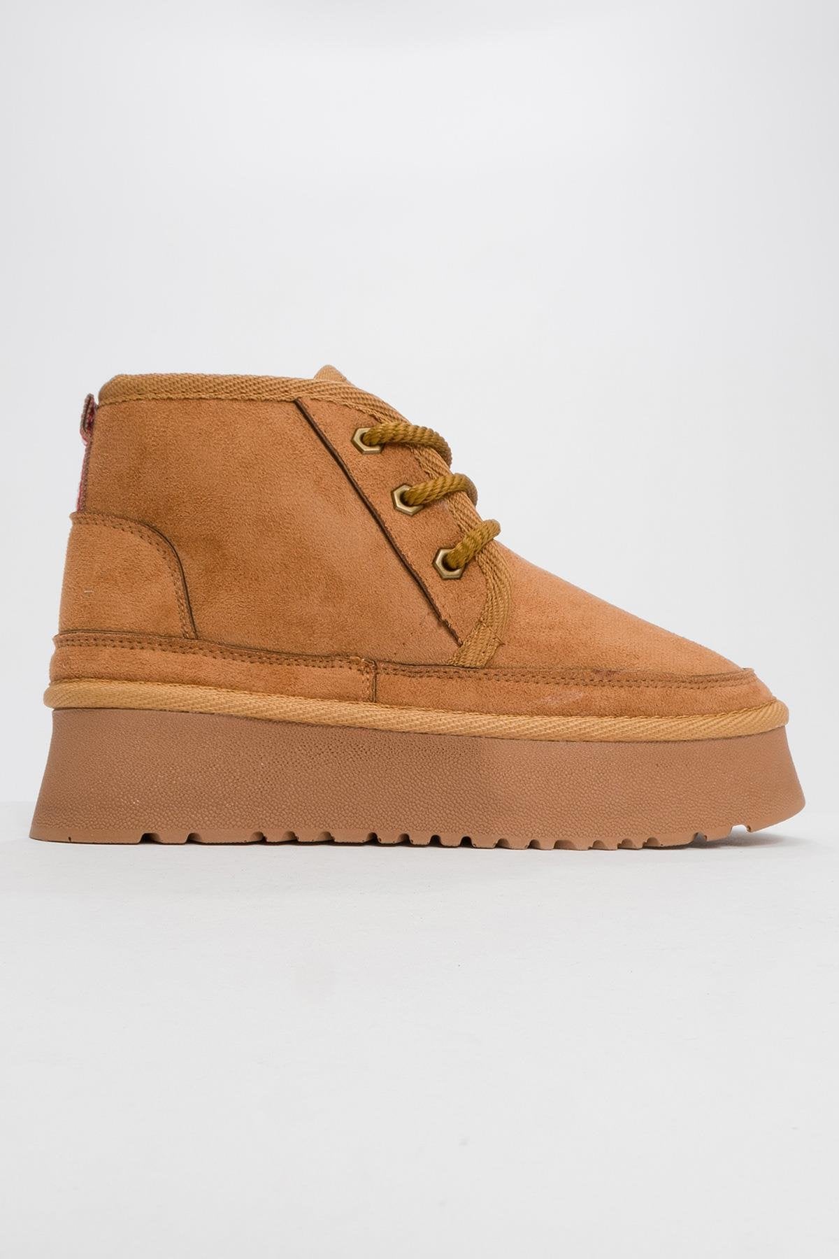 Ovela - Bota deportiva de cordones con suela gruesa color coñac (mujer)