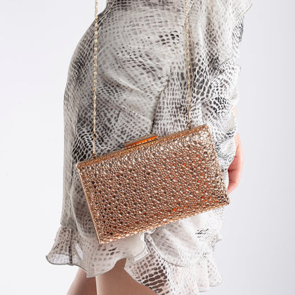 Clara - Bolso de mano de lentejuelas oro rosado