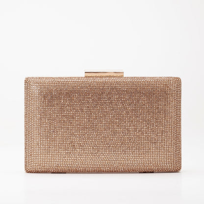 Clara - Bolso de mano brillante oro rosa