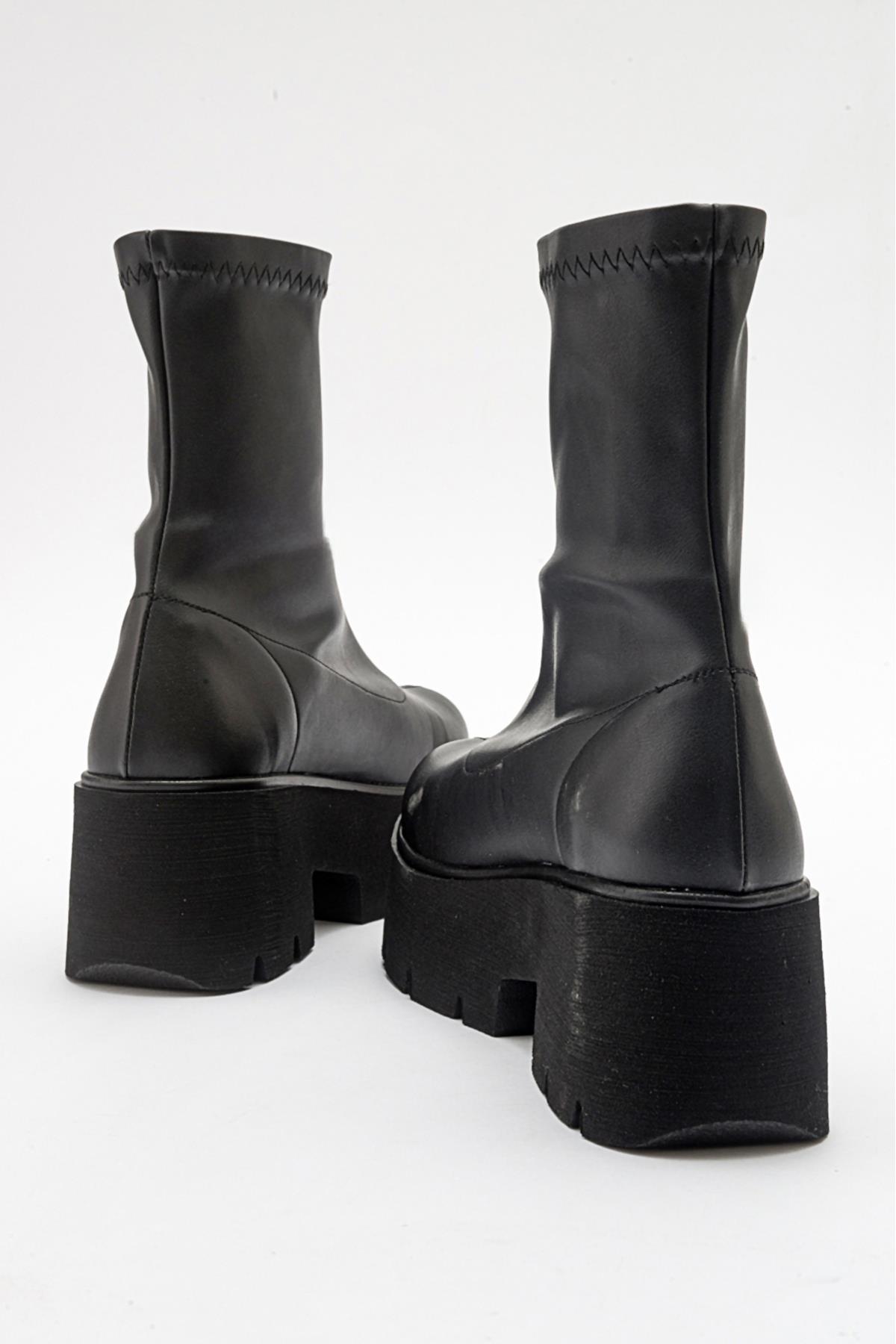 Ovil - Bota de plataforma elástica negra con cremallera (Mujer)