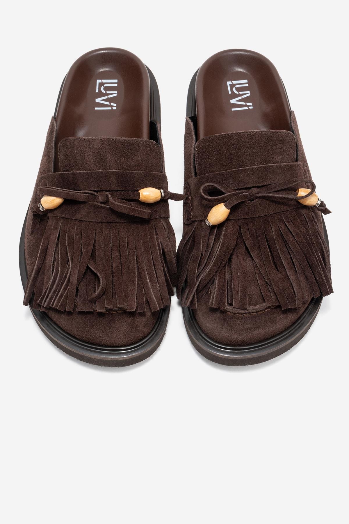 Carol - Mules de cuero de ante marrón con borlas (Mujer)