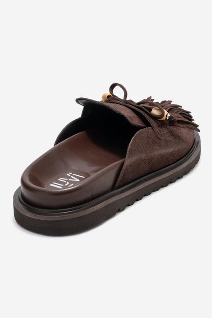 Carol - Mules de cuero de ante marrón con borlas (Mujer)