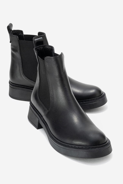 Orliss - Botín Chelsea de cuero genuino negro con paneles elásticos (mujer)