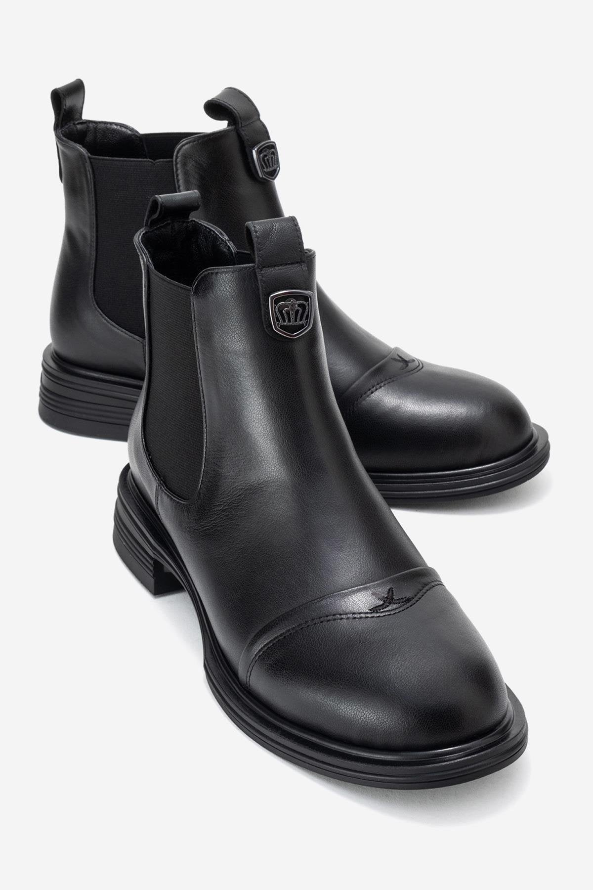 Sidney - Bota Chelsea de cuero negro con hebillas (Mujer)