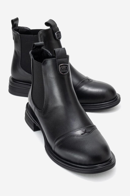 Sidney - Bota Chelsea de cuero negro con hebillas (Mujer)