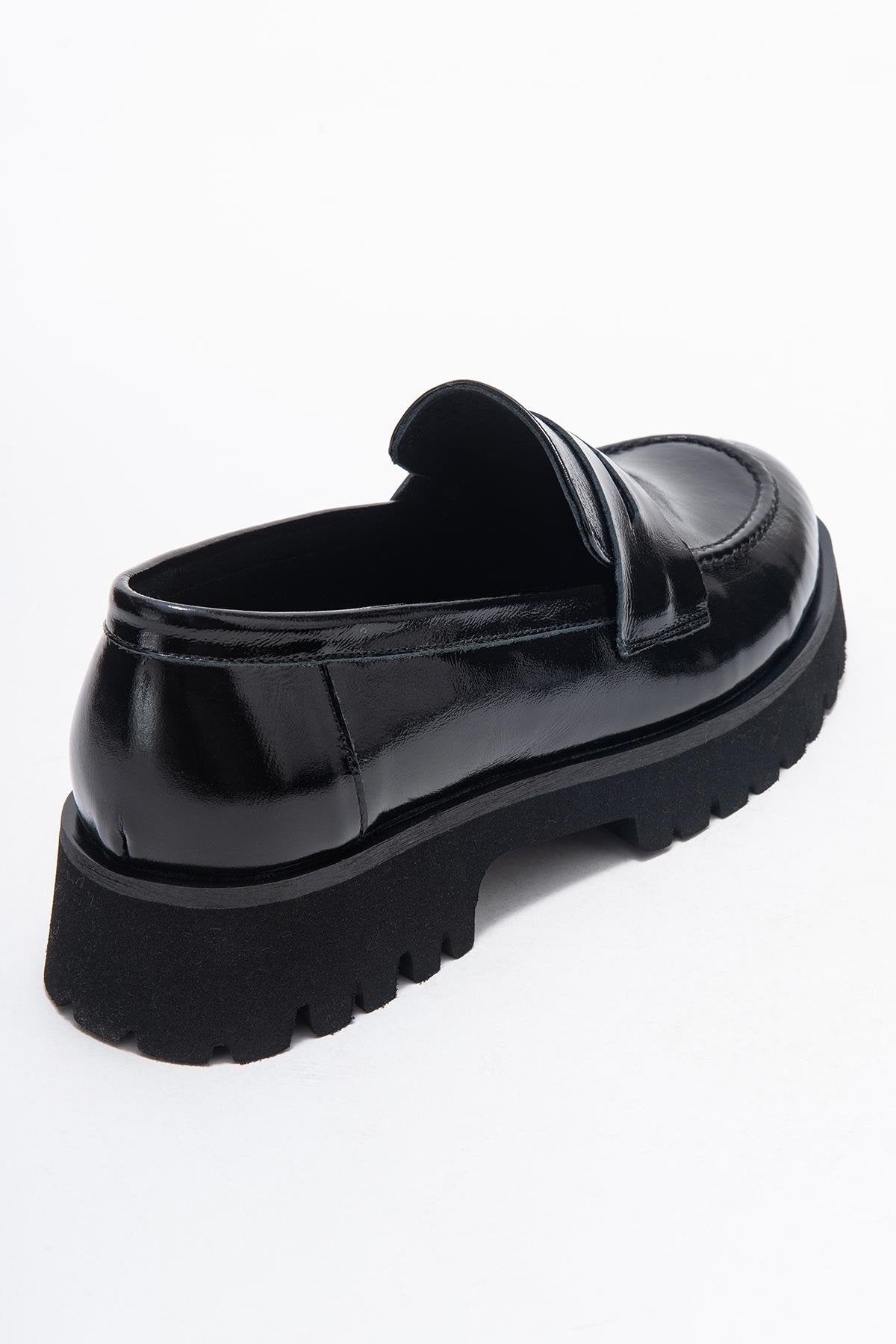 Vionel - Mocasín de charol negro (mujer)