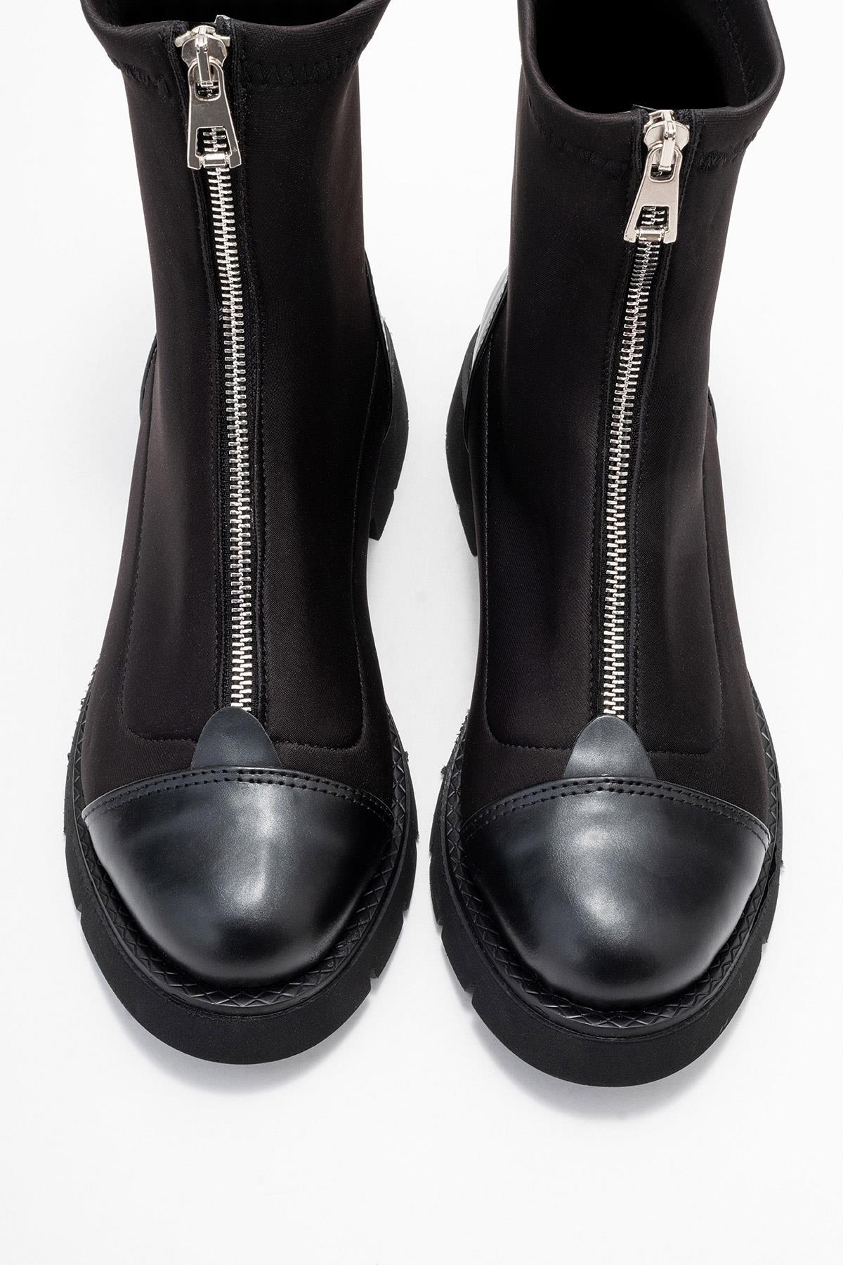 Martos - Botín elástico negro con cremallera frontal (Mujer)