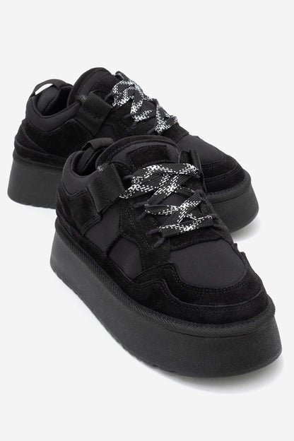 Riven - Zapatilla de plataforma de piel de ante negra (Mujer)
