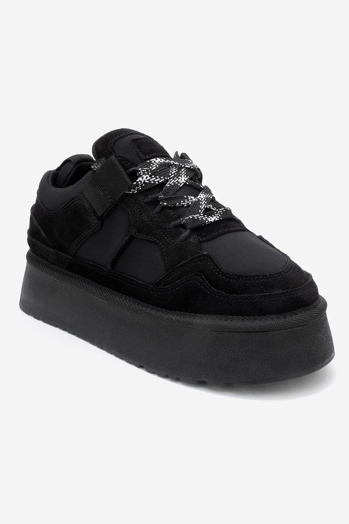 Riven - Zapatilla de plataforma de piel de ante negra (Mujer)