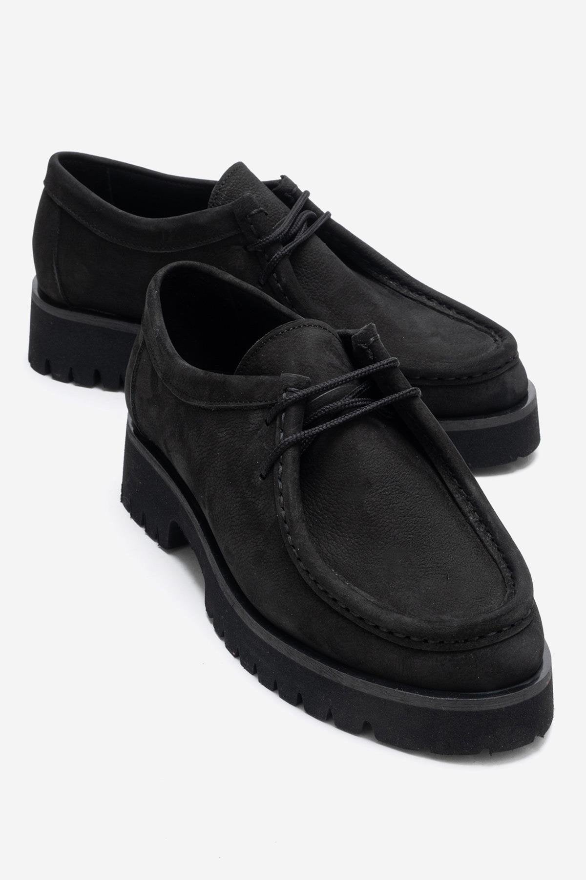 Talia - Mocasín de cuero nobuk negro con cordones (mujer)