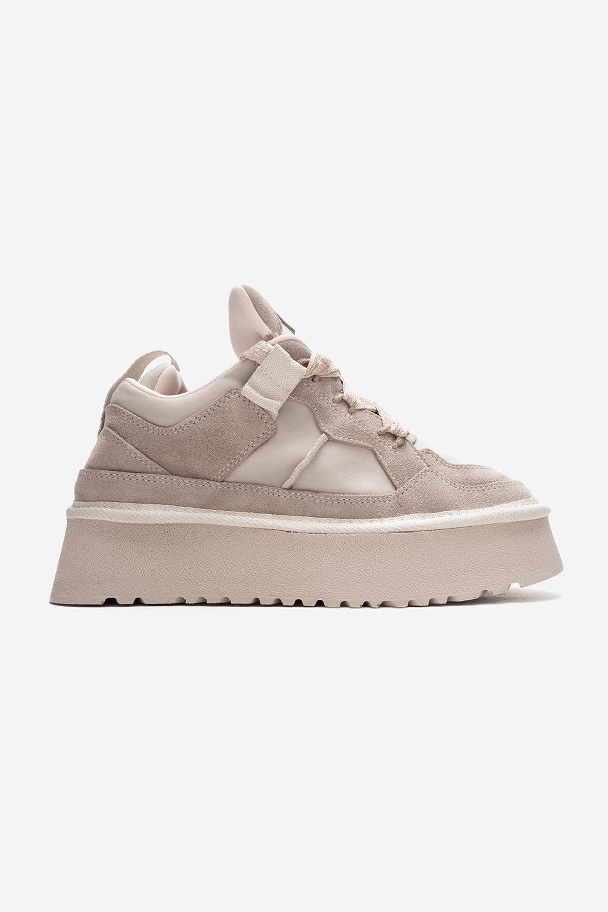 Riven - Zapatilla de plataforma de piel de ante beige (Mujer)
