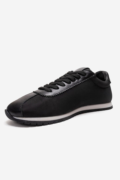 UNICA - Zapatilla deportiva de cuero negro genuino (Mujer)