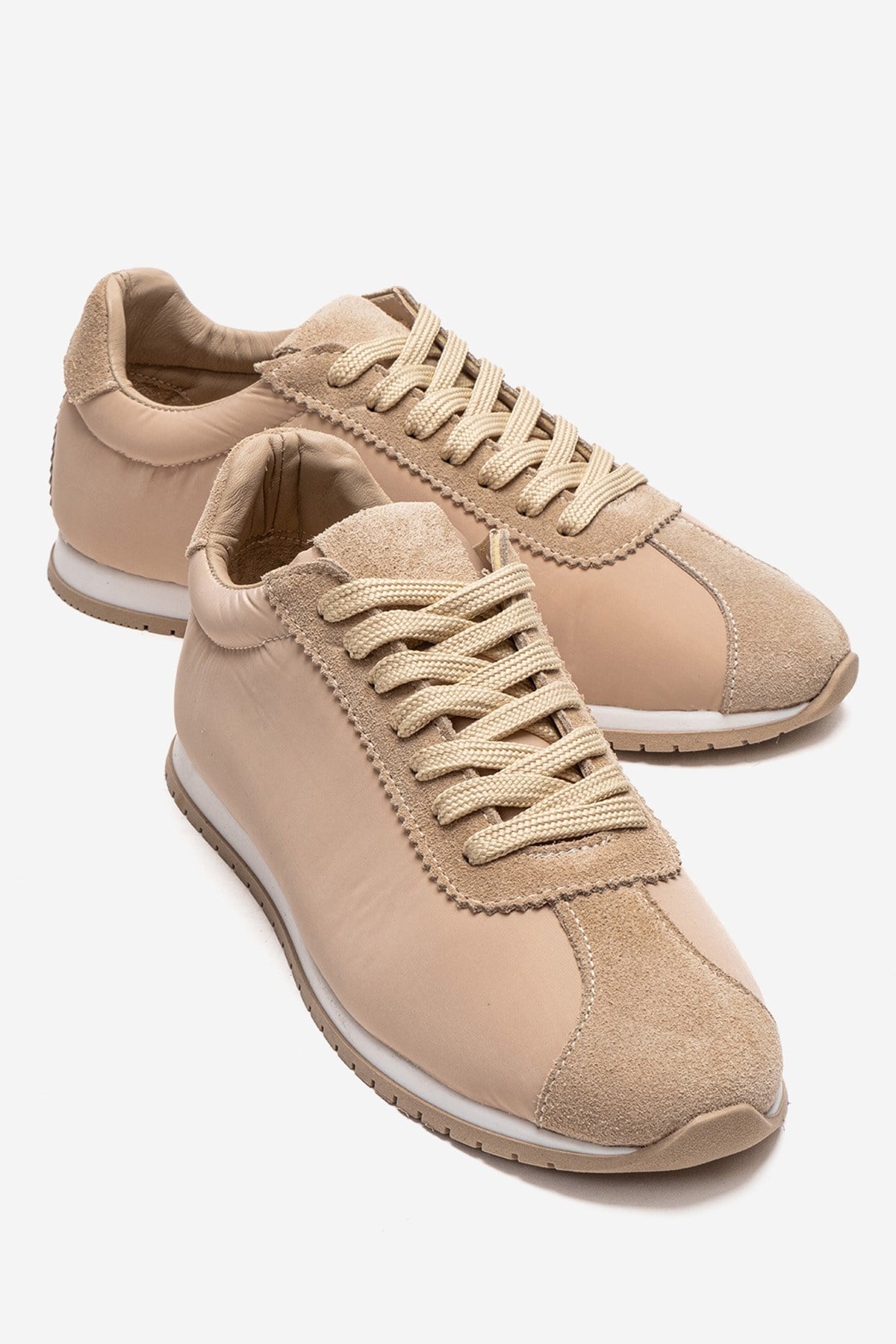 UNICA - Zapatilla de piel genuina beige (mujer)