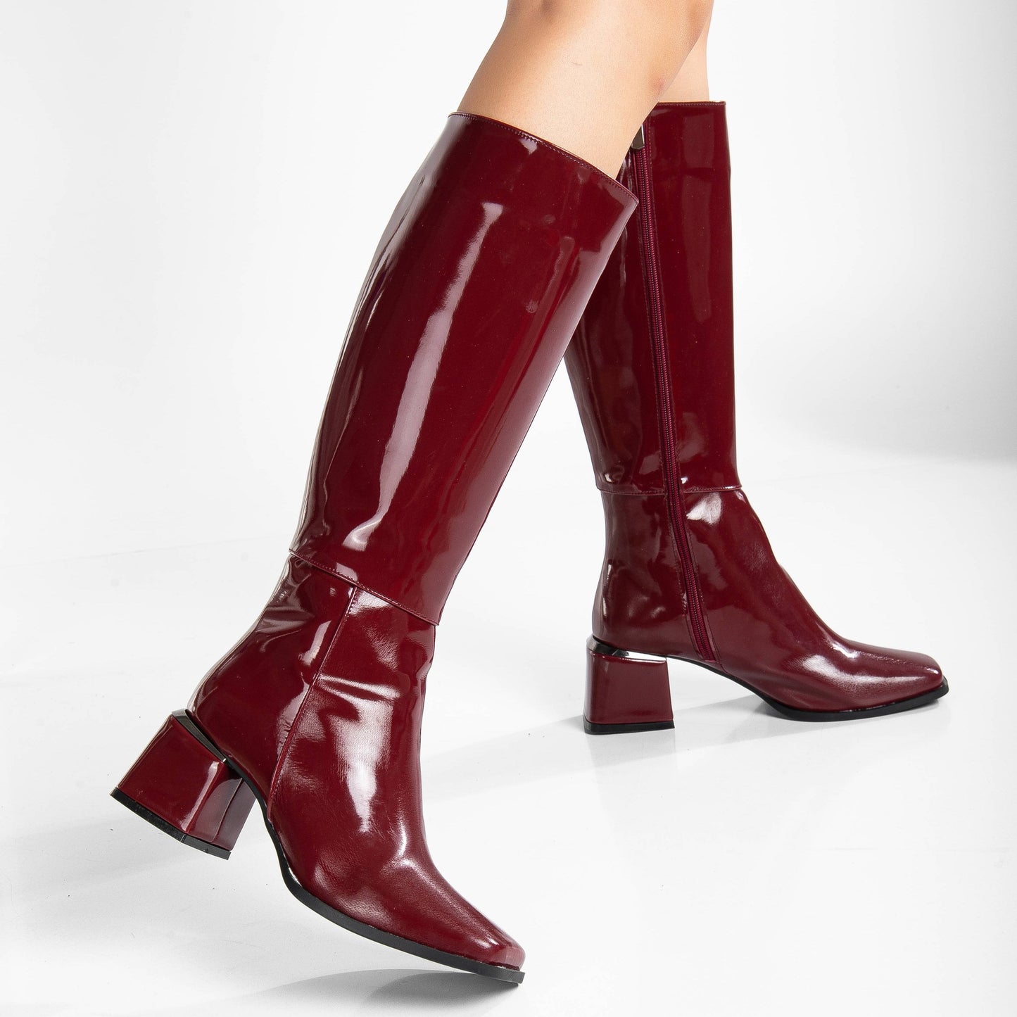 vegan knee high boots, burgundy knee high boots, cruelty-free footwear, eco-friendly fashion, sustainable boots, plant-based leather, burgundy vegan boots, non-leather boots, animal-free footwear, ethical fashion, vegan heeled boots, stylish knee high boots, elegant burgundy boots, high heel boots, vegan leather boots, luxurious vegan boots, women's vegan footwear