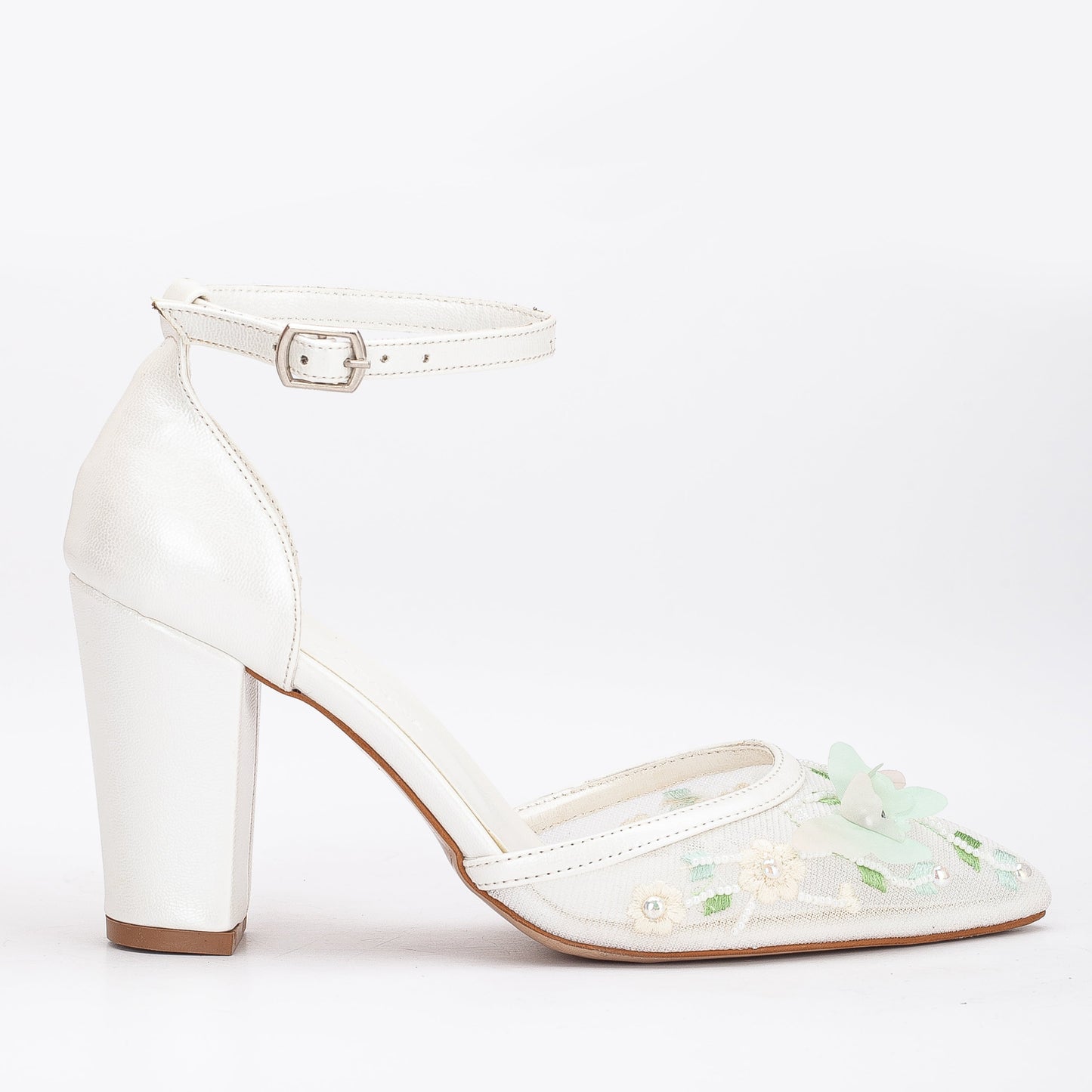 White lace embroidered heels, Embroidered white lace heels, White lace wedding heels with embroidery, Lace bridal heels with embroidery, White lace embroidered pumps, Embroidered lace bridal shoes, White lace heels with floral embroidery, Embroidered lace wedding shoes, White lace heels with intricate embroidery, Lace bridal heels with delicate embroidery.