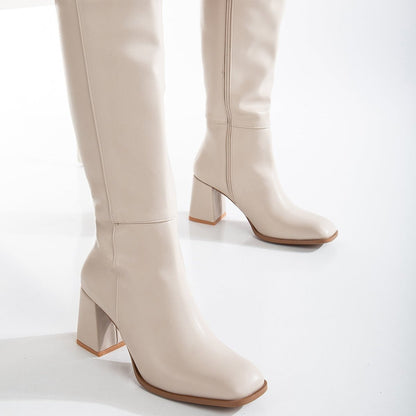 Vegan knee-high boots, beige knee-high boots, sustainable knee-high boots, women's vegan boots, cruelty-free knee-high boots, eco-friendly knee-high boots, vegan leather boots, stylish vegan boots, beige vegan boots, knee-high boots for women.