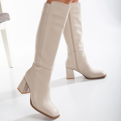 Vegan knee-high boots, beige knee-high boots, sustainable knee-high boots, women's vegan boots, cruelty-free knee-high boots, eco-friendly knee-high boots, vegan leather boots, stylish vegan boots, beige vegan boots, knee-high boots for women.
