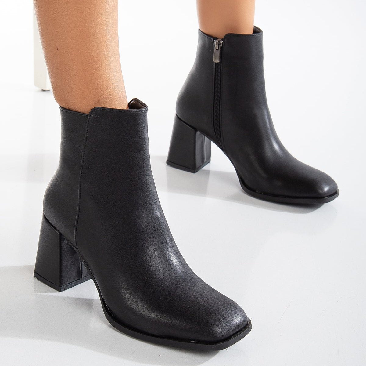 Vegan ankle-high boots, black ankle-high boots, sustainable ankle-high boots, cruelty-free ankle-high boots, eco-friendly ankle-high boots, vegan leather ankle-high boots, women's black ankle boots, stylish black ankle boots, faux leather ankle-high boots, black vegan boots.