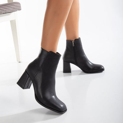 Vegan ankle-high boots, black ankle-high boots, sustainable ankle-high boots, cruelty-free ankle-high boots, eco-friendly ankle-high boots, vegan leather ankle-high boots, women's black ankle boots, stylish black ankle boots, faux leather ankle-high boots, black vegan boots.