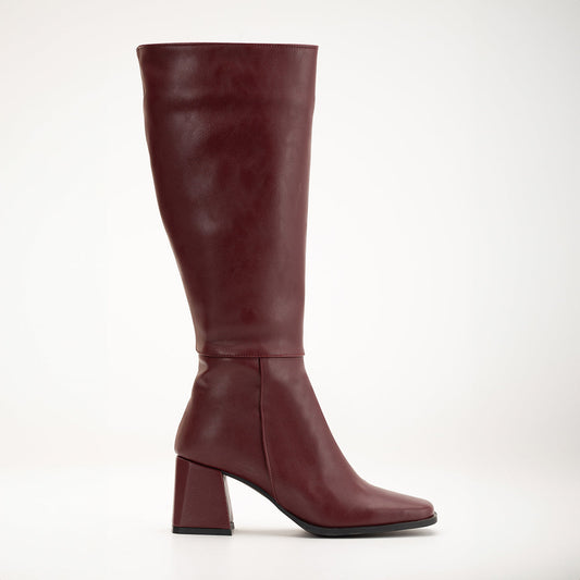 Vegan knee-high boots, black knee-high boots, burgundy knee-high boots, sustainable knee-high boots, cruelty-free knee-high boots, eco-friendly knee-high boots, vegan leather knee-high boots, women's knee-high boots, stylish knee-high boots, faux leather knee-high boots.