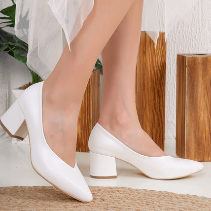 White low heel pumps, Low heel pumps in white, Stylish white pumps, Chic low heel white shoes, Trendy white low heel pumps, Fashionable white pumps, Elegant low heel white pumps, Classic white low heel shoes, Comfortable white low heel pumps, White low heel pumps for women.