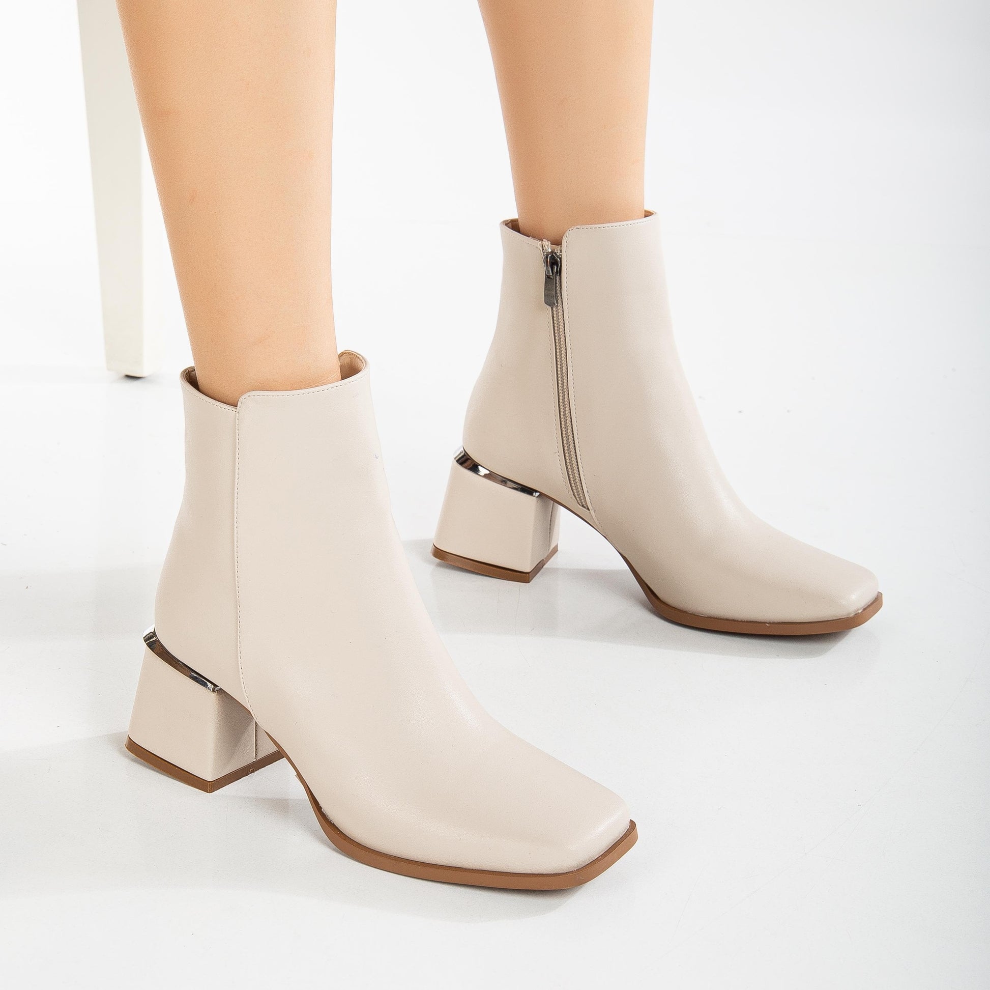 vegan ankle boots, beige ankle boots, cruelty-free footwear, eco-friendly boots, sustainable fashion, plant-based leather, beige vegan boots, non-leather boots, animal-free footwear, ethical fashion, vegan suede boots, comfortable vegan boots, neutral color boots, stylish vegan boots, women's vegan footwear