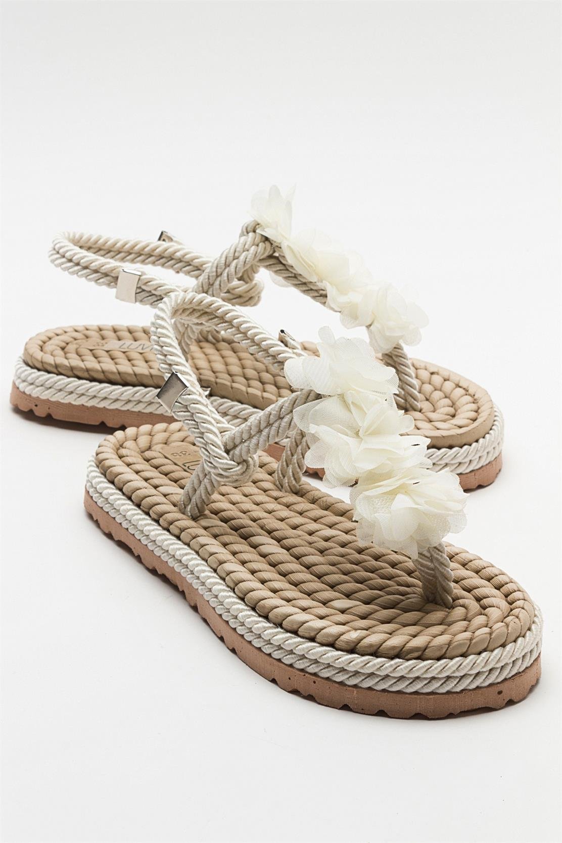 SANTRA Beige Lace-Up Thong Sandals (Women)