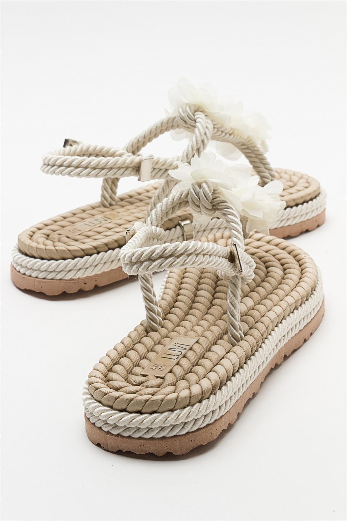 SANTRA Beige Lace-Up Thong Sandals (Women)