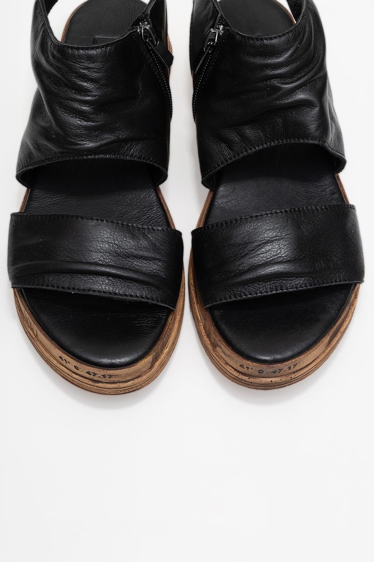 Lunas Black Leather Side‑Zip Flat Heel Sandal (Women)
