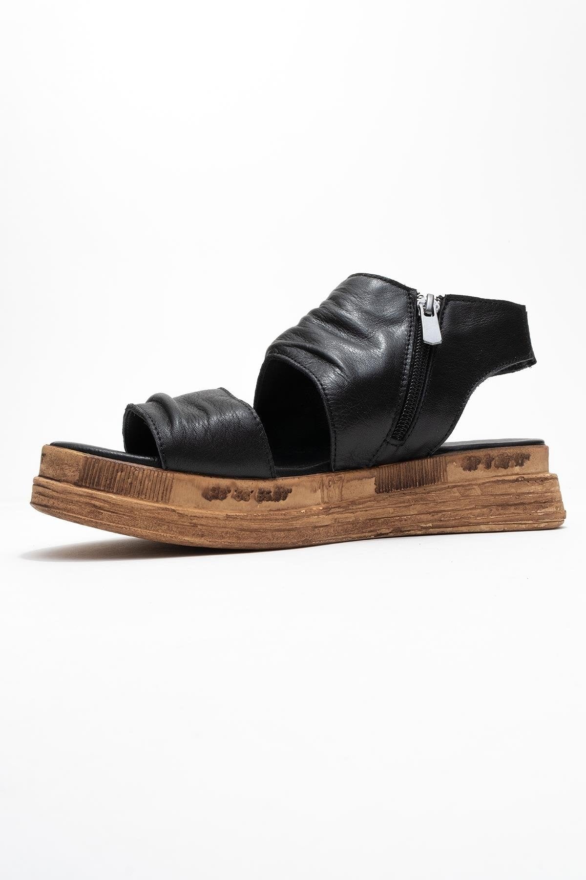 Lunas Black Leather Side‑Zip Flat Heel Sandal (Women)