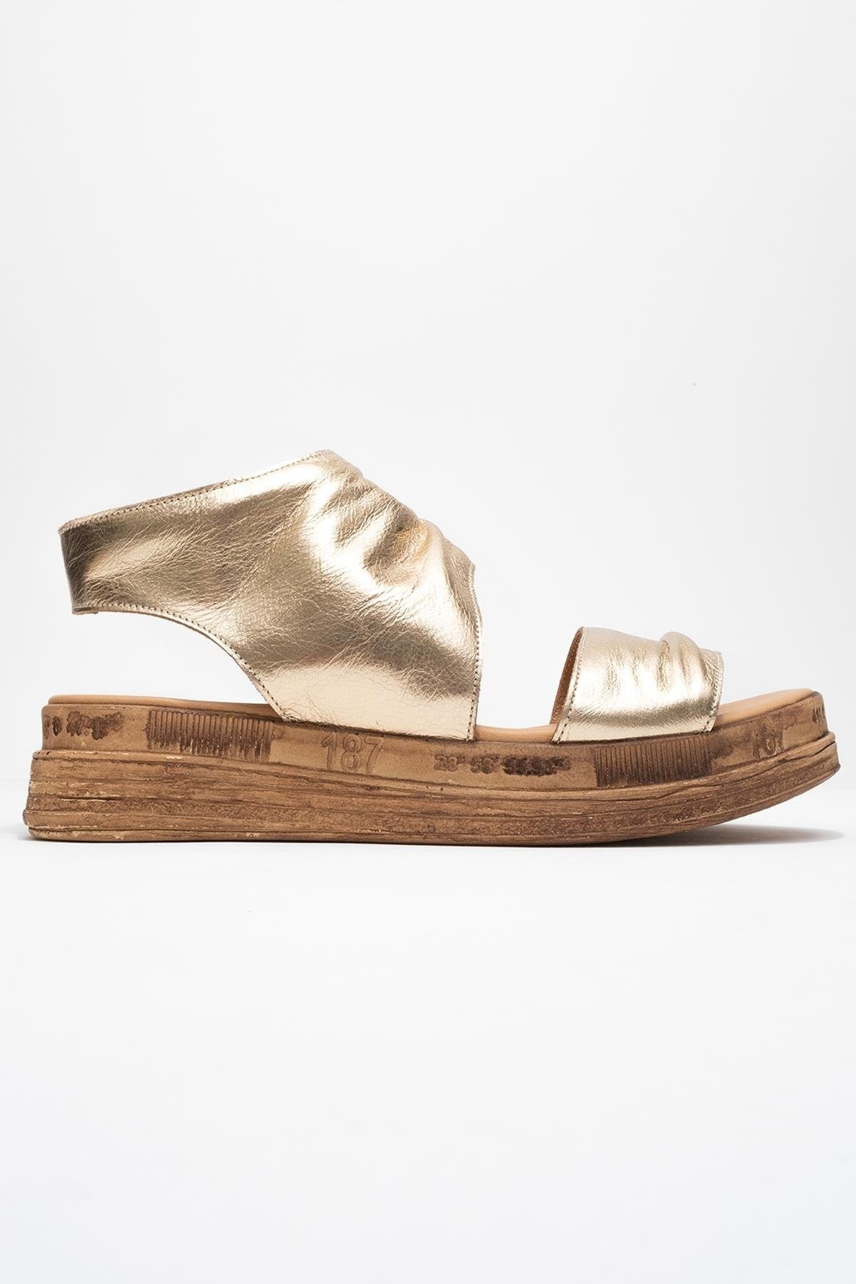 Lunas Gold Leather Side‑Zip Flat Heel Sandal (Women)