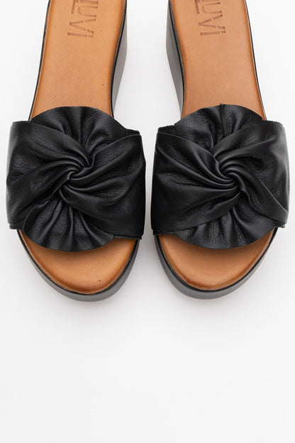 Syndra - Black Bow Wedge Leather Sandal (Women)