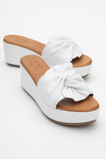 Syndra - White Bow Wedge Leather Sandal (Women)
