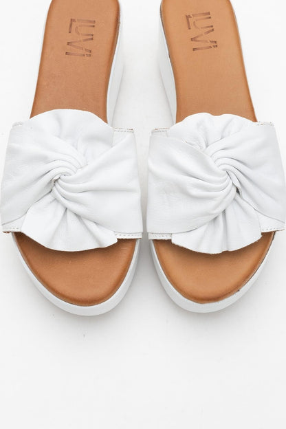 Syndra - White Bow Wedge Leather Sandal (Women)